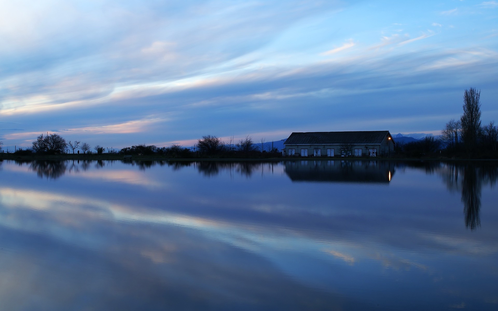 lake night building reflection