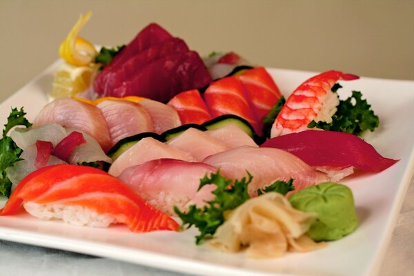 Seafood sashimi on a white plate