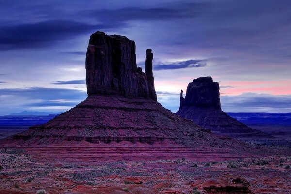 A mountain with iridescent colors