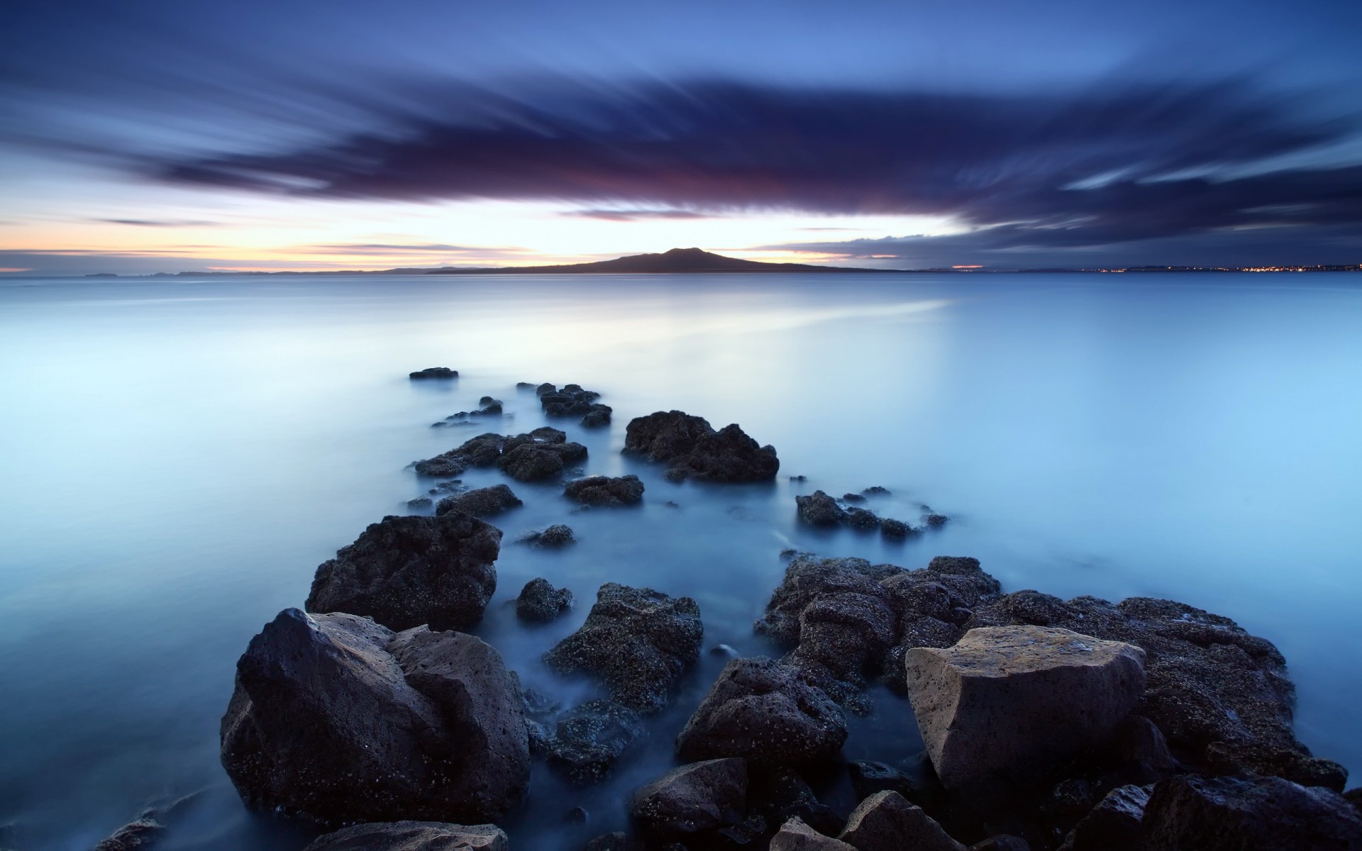 pierres eau lac nuages