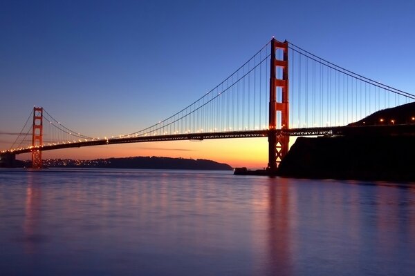 Golden lights on the evening bridge