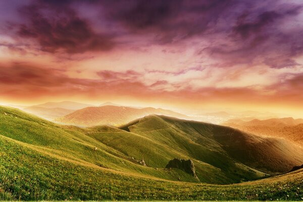 Green hills. Bright clouds