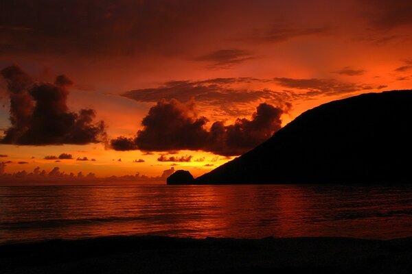 Seashore with clouds and sunset glow