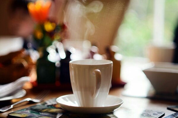 Morning coffee in a white cup