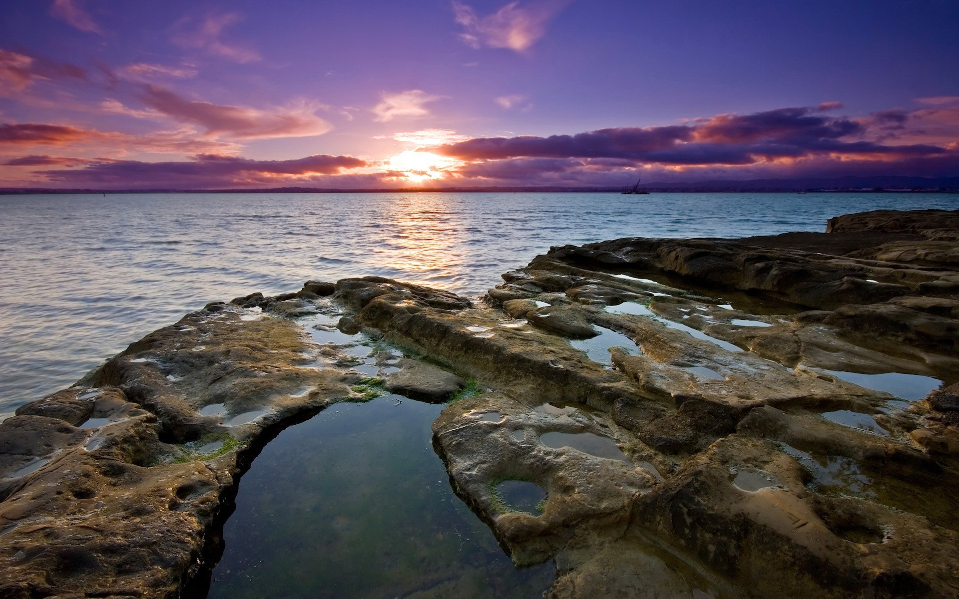 pietre acqua tramonto