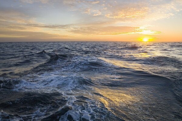 Beautiful sunrise under the ocean waves