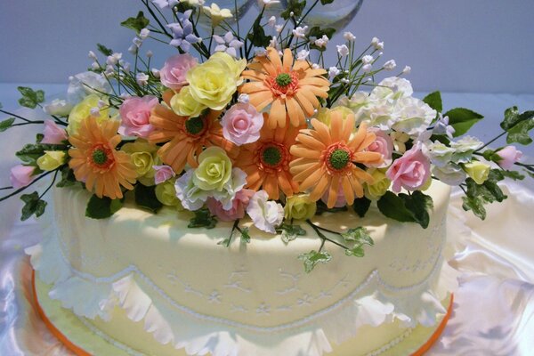 Sweet icing cake decorated with flowers