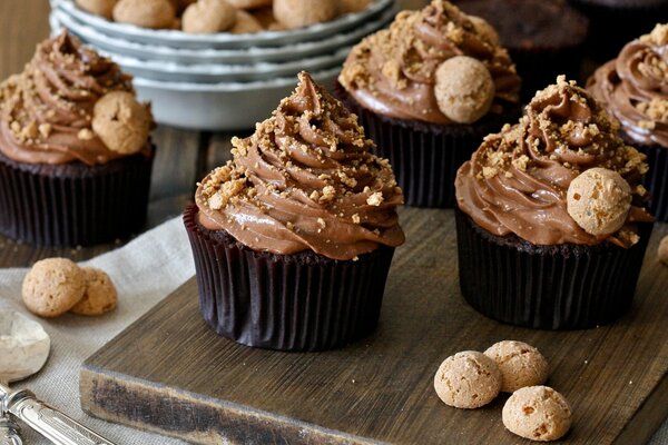 Homemade sweets with chocolate, decorated with cookies