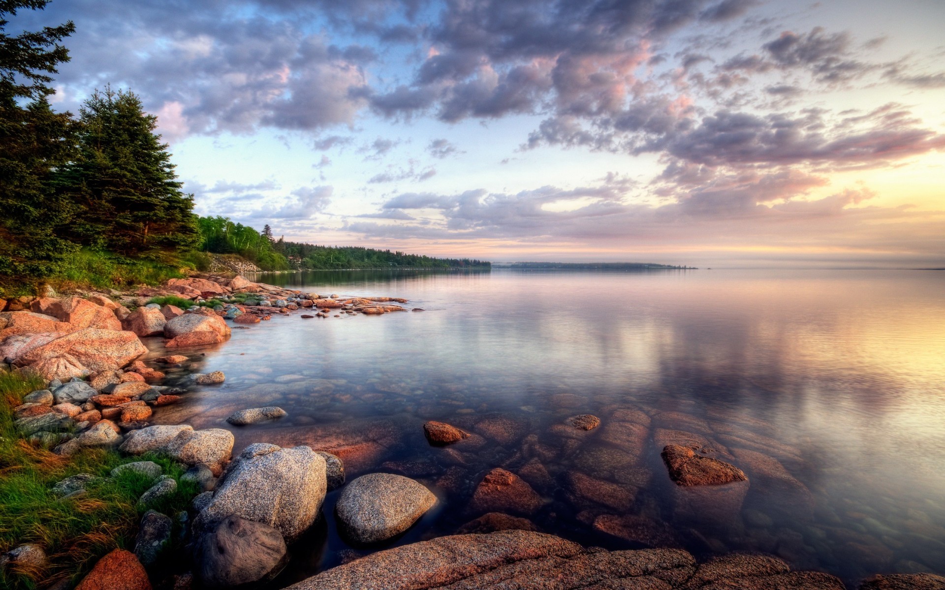 beach stones clouds lake