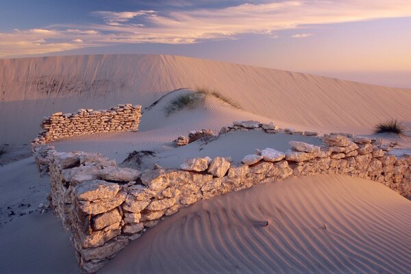 Desert sand with a layout of stones