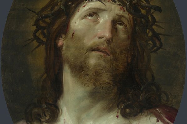 The head of the crucified Jesus Christ in the crown of thorns