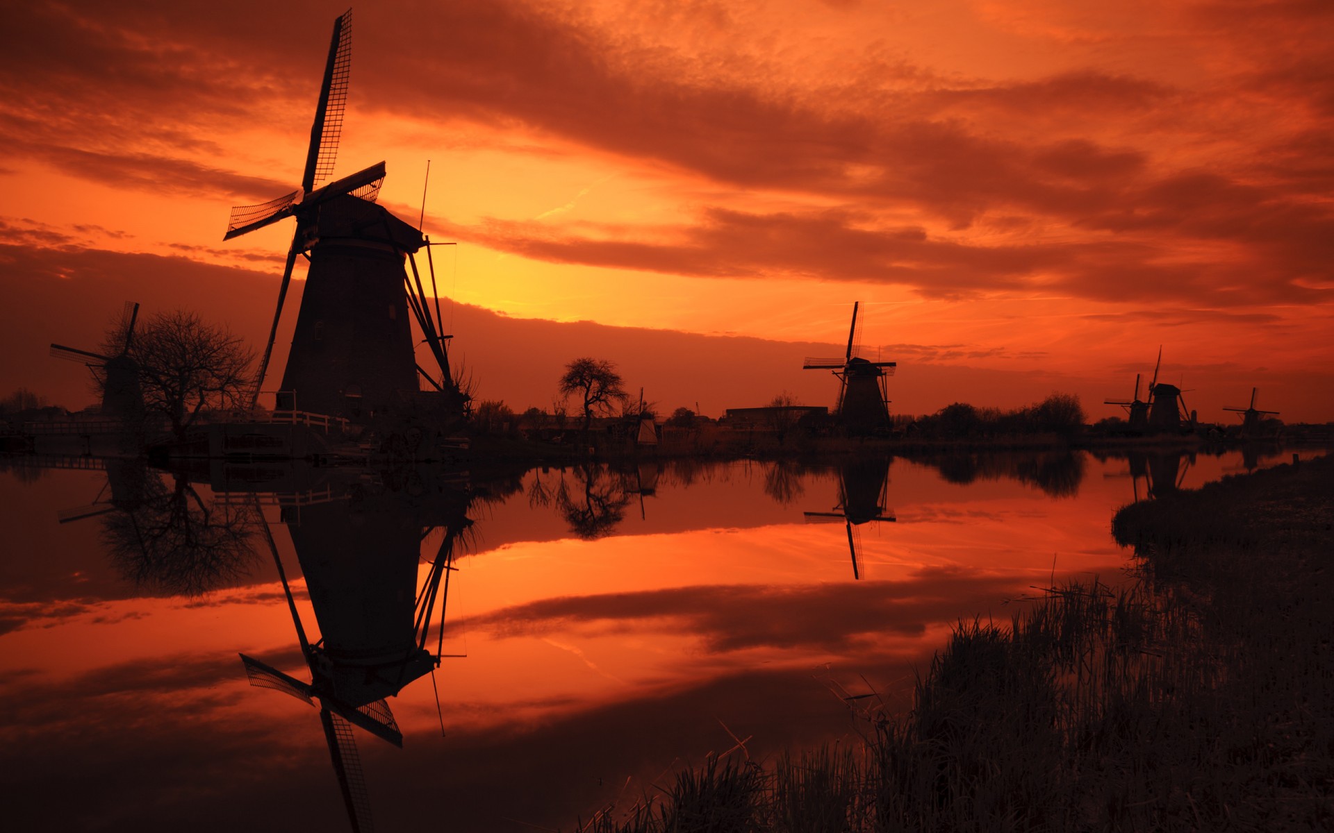 kinderdijk puesta del sol países bajos molinos de viento molinos de viento cielo