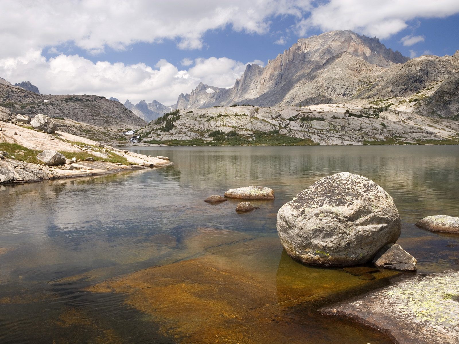 mountain river mountains rocks sky below titcomb basin bridge national forest wyoming