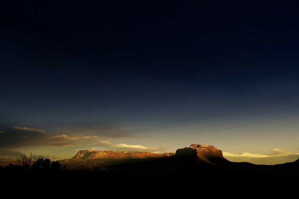 A band of light between earth and sky