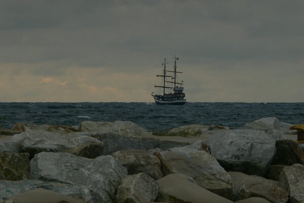 Wall-mounted shore with a ship in the sea