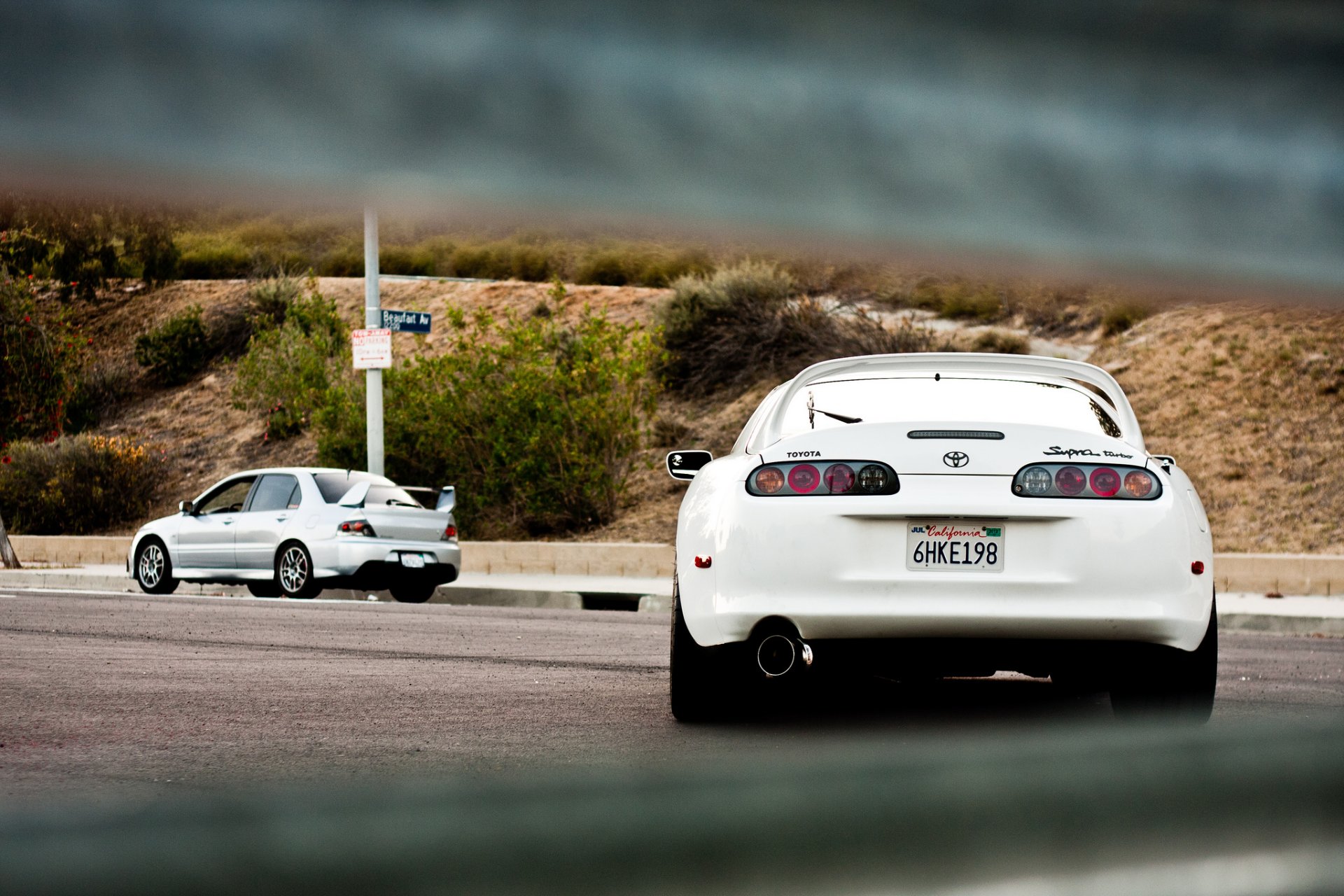 toyota above white mitsubishi lancer evolution viii silver toyota supra white rear mitsubishi lancer evolution silver