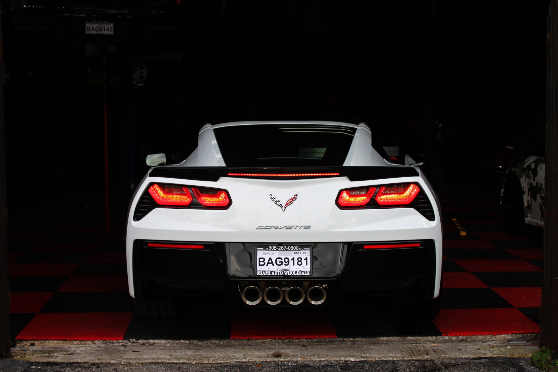 chevrolet corvette stingray car white back garage c7