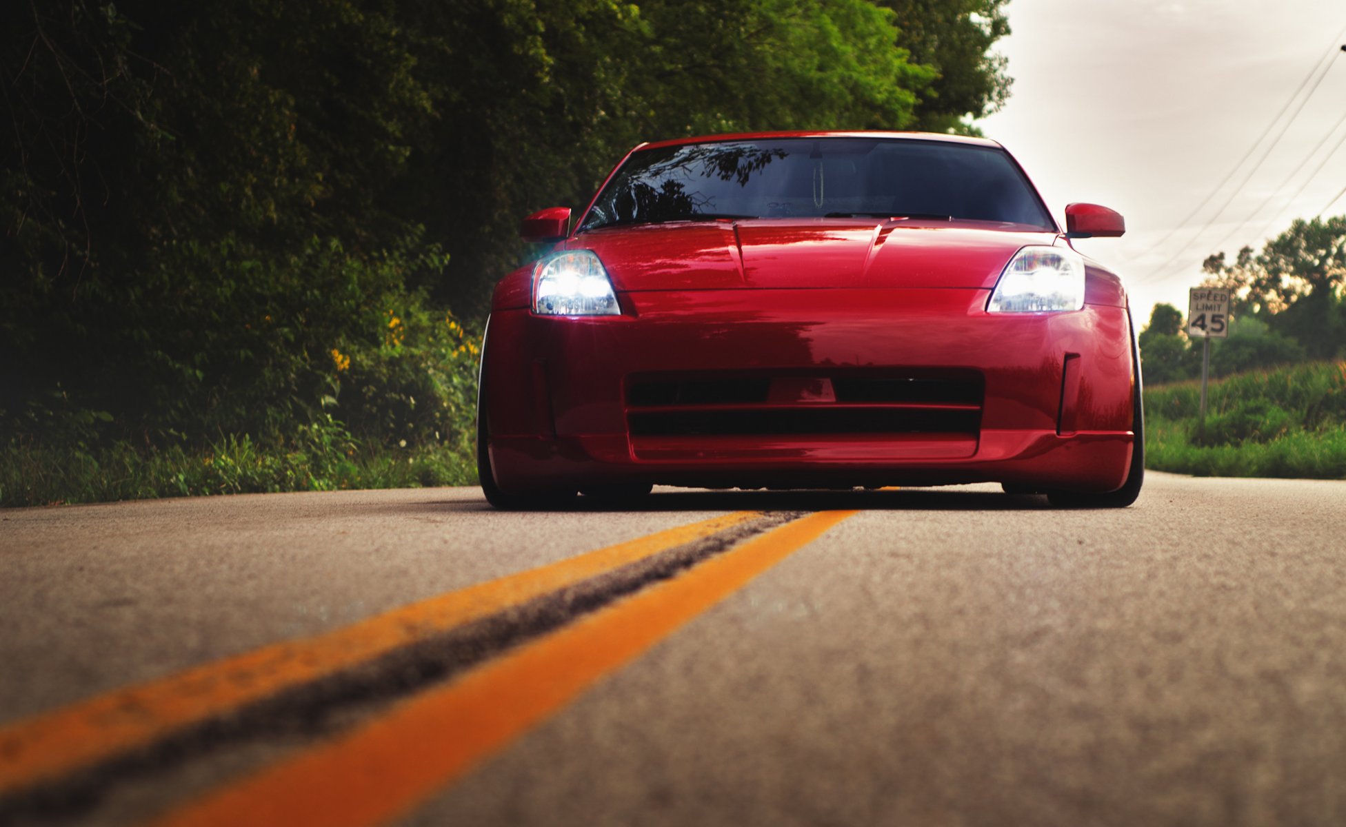 nissan 350z rojo posición nissan rojo frente carretera