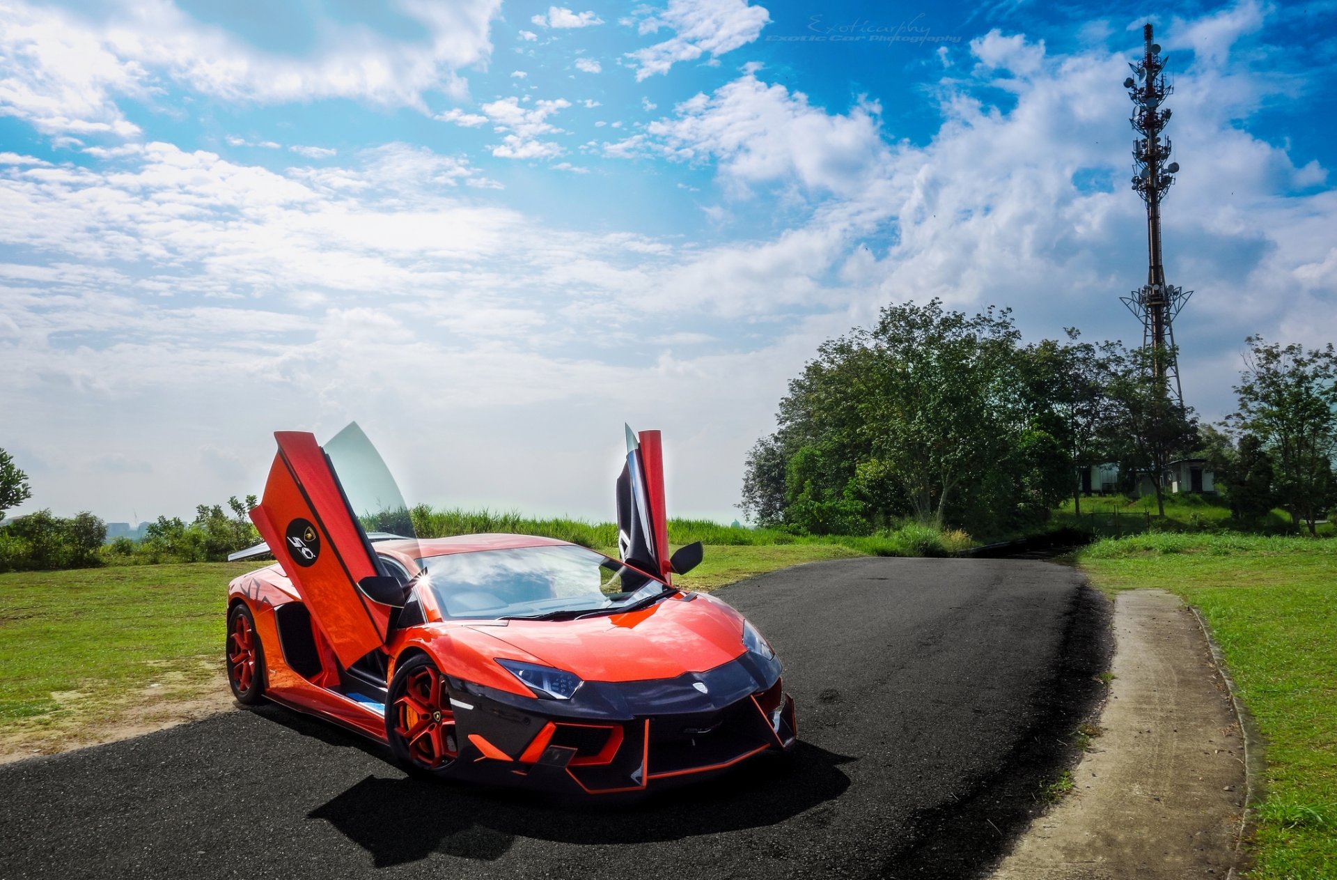 lamborghini dmc aventador lp900sv orange lamborghini aventador vorderansicht straße rasen bäume himmel wolken