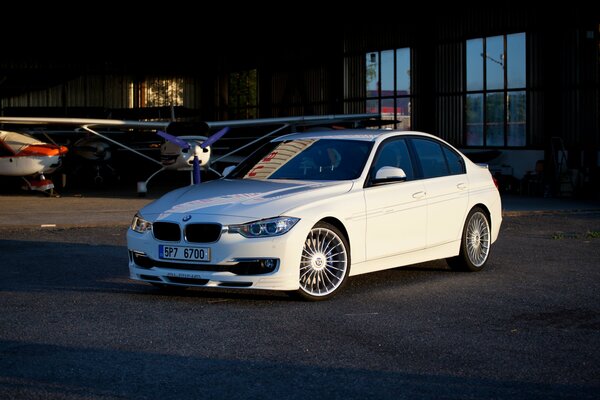 White beautiful BMW with a beautiful view