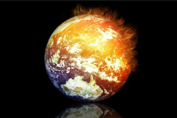 Reflection of the planet Earth with a fiery hemisphere