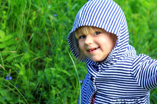 A girl in a blue striped blouse