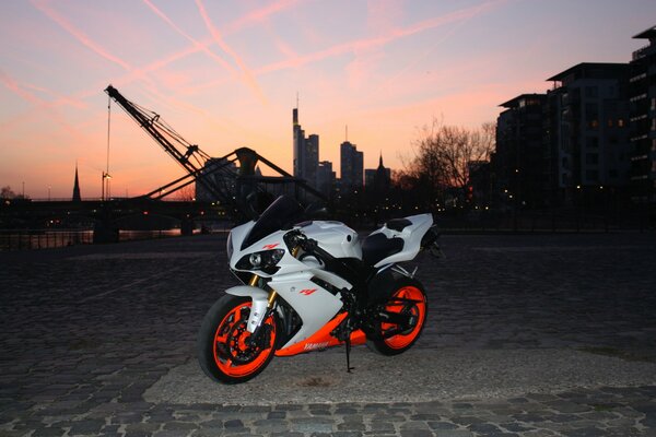 White Yamaha motorcycle at dusk