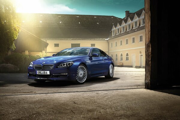 Blue car in the sun