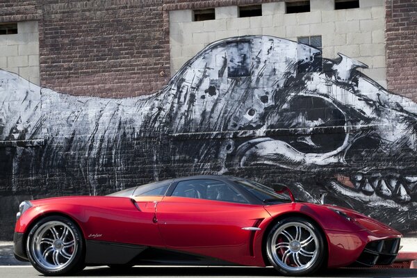 Red pagani huayra and dinosaur drawing