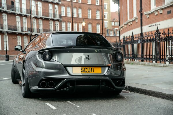 Silver ferrari parked in London