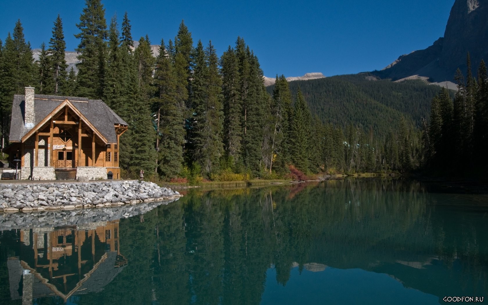 haus see berge stille fotograf