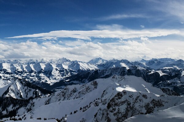 Alpine mountains with snow on the tops