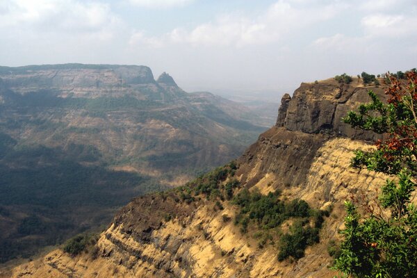 The slope of the mountain to the clouds