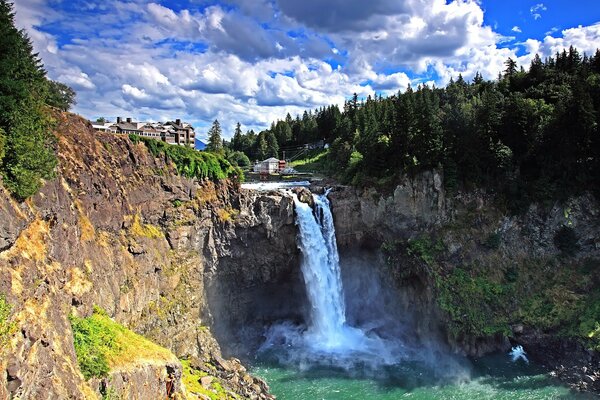 An extraordinary view from the castle to a quiet forest with a waterfall