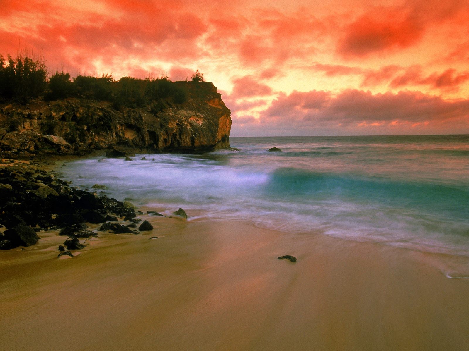 playa puesta de sol olas