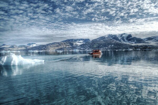 Ice and a boat floating in the distance