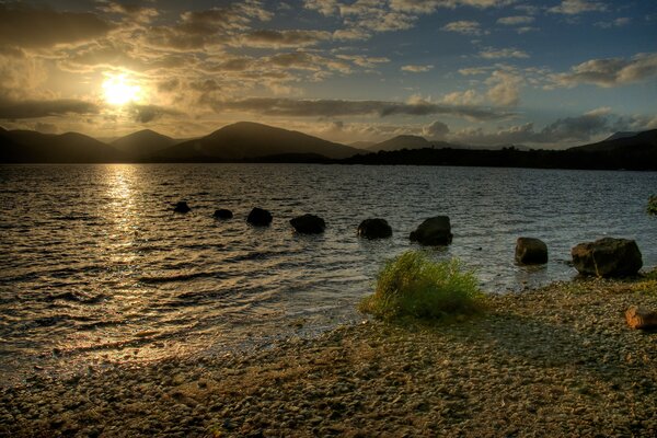 Beautiful stones in a row in the sea