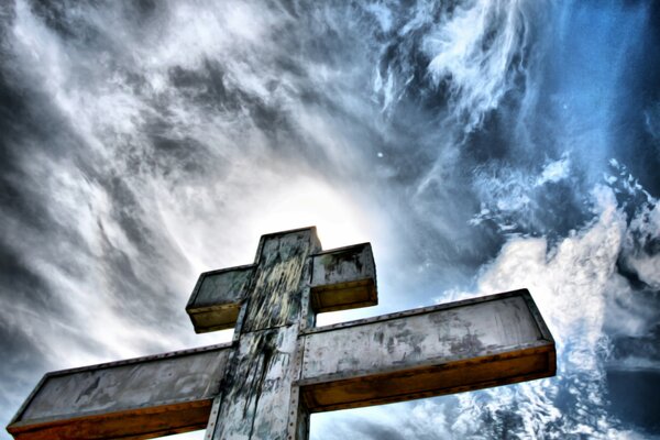 A religious cross going up into the sky