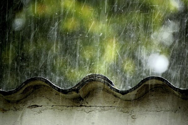 Rain hits the slate roof