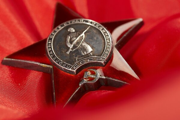 Award star of the USSR on the red flag