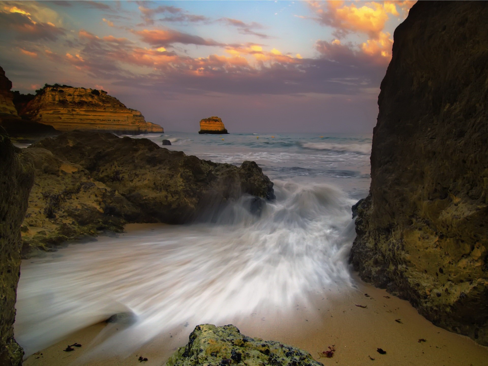 onda mare pietre cielo