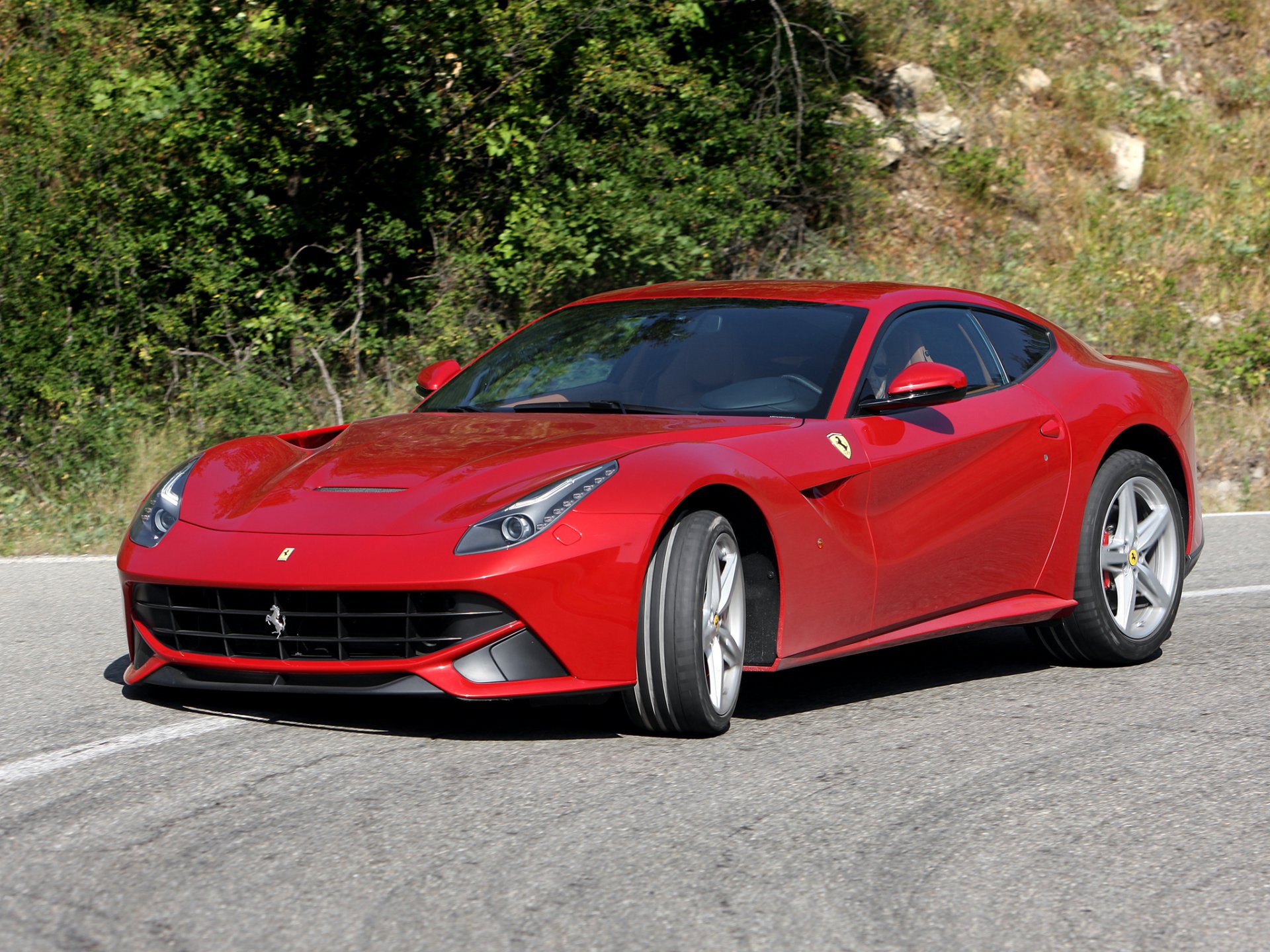 ferrari f12 berlinetta road trees front end ferrari f12