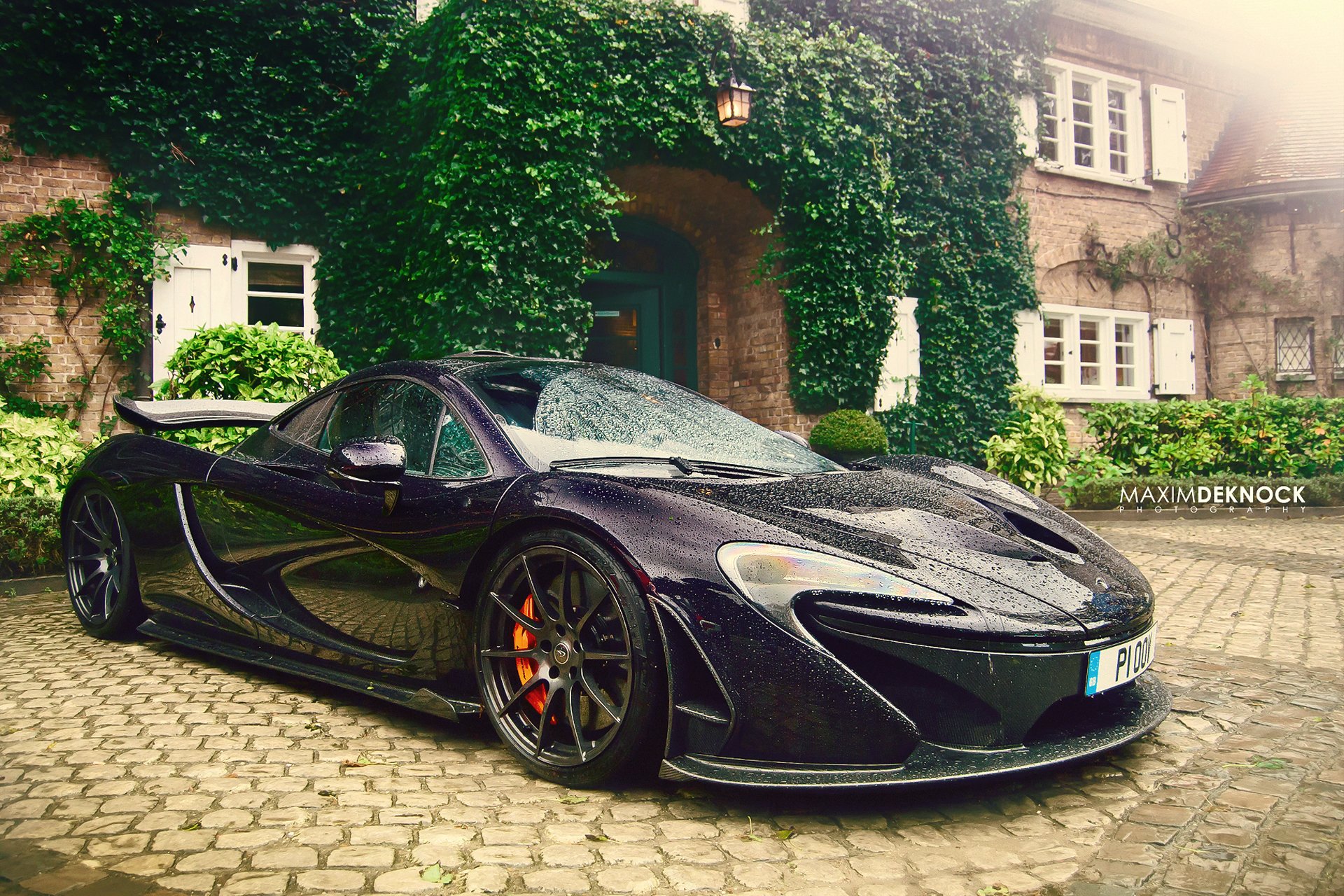 mclaren p1 after the rain wet drops haze paving bush house