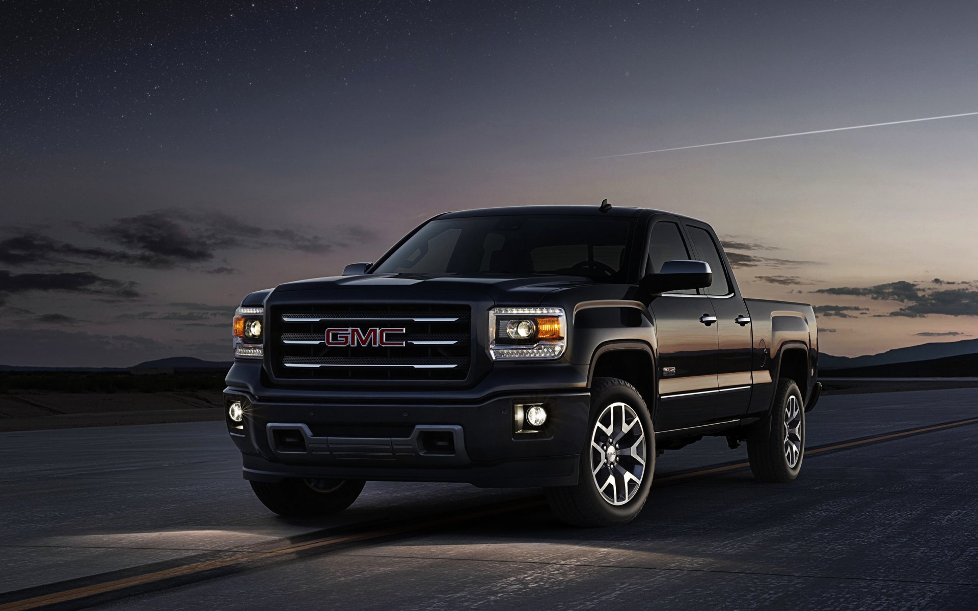 gmc sierra pick-up noir voiture avant logo ciel soirée