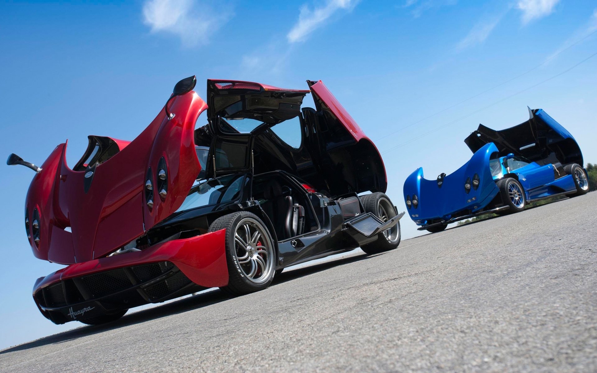 pagani zonda huayra pagani sonda huira superdeportivos rojo azul frente cielo