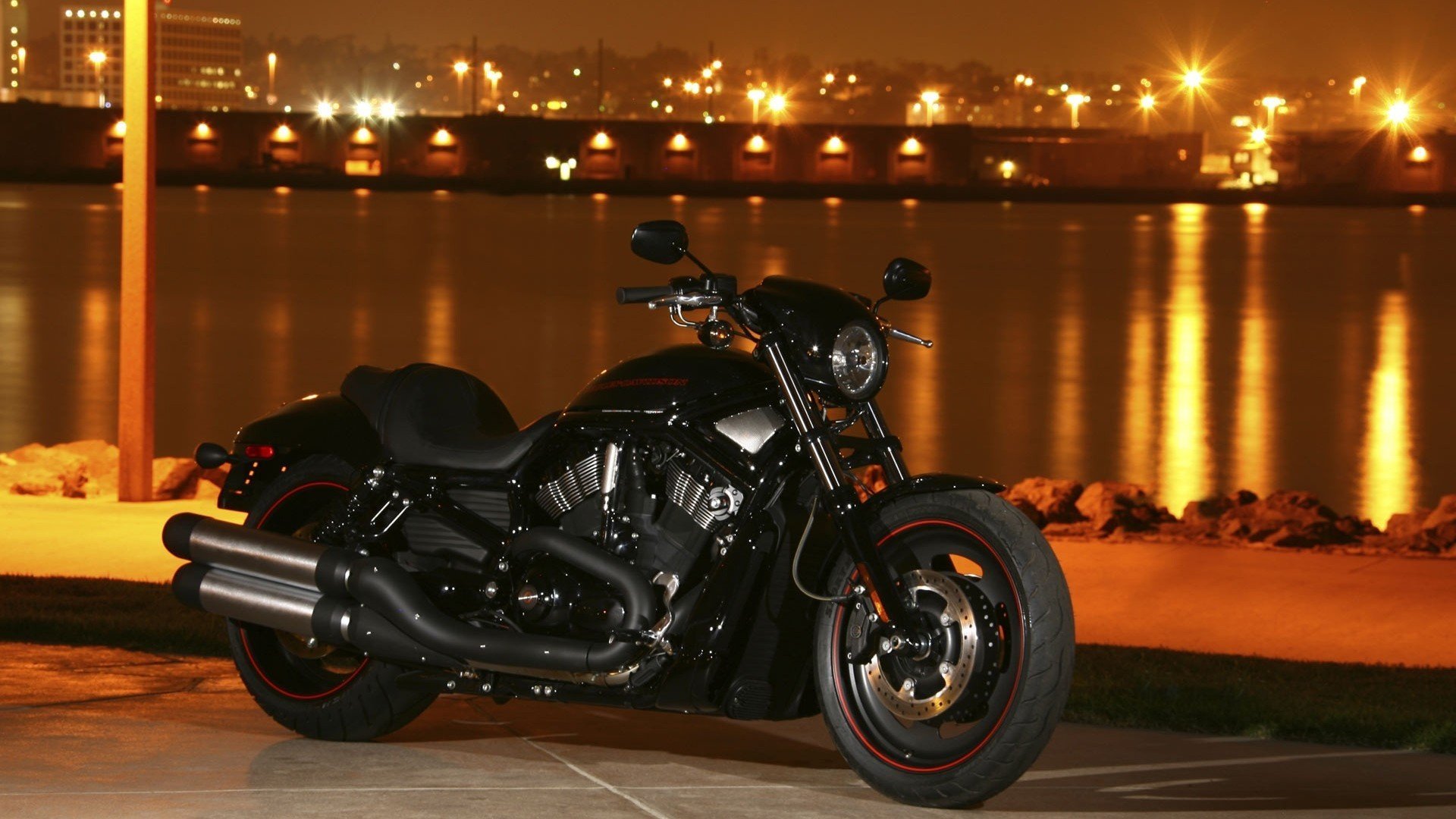 harley-davidson bicicleta ciudad noche luces río