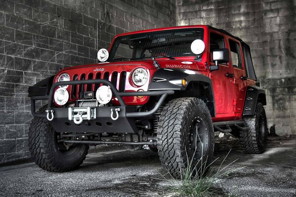 Carta da parati con jeep wrangler SUV rosso