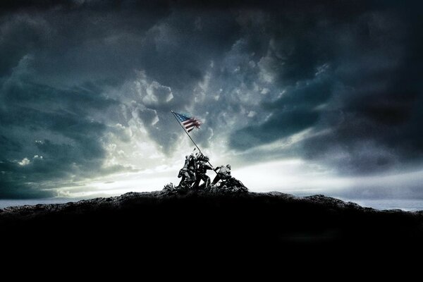 Military with a flag on a beautiful sky background