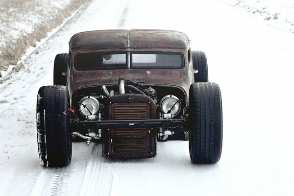 Retro Volkswagen on a snowy road