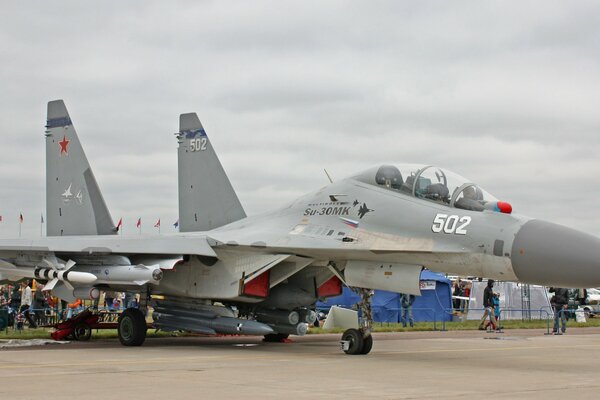 The Su-30 aircraft is on the runway